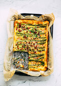 Puff pastry tart with green asparagus and bacon