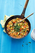 Exotic coconut and vegetable curry with plantains