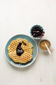 Banana waffles with blueberry sauce