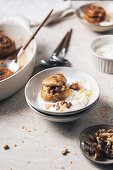 Baked apples with dates, walnuts and creme fraiche