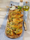 Filled wheat bread with zucchini, ricotta and pine nuts