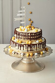 Chocolate drip cake with caramel and espresso cream