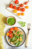 Pizzoccheri with rocket pesto and tomatoes
