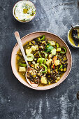 Wild rice and potato stew with chipotle oil