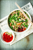 Fried rice with chicken, peas and sweet chilli sauce