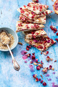 White chocolate bark with pomegranate and rose petals