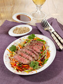 Asian beef salad with sesame seeds