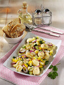 Gnocchi salad with courgettes and red onions