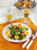 Summer greens salad with bacon, mustard potatoes and boiled eggs