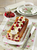 Cheese and cherry loaf cake with cream and pistachios
