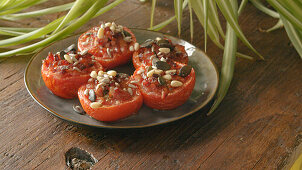 Roasted tomatoes with bacon and dried fruits