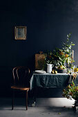 Winter table in front of black wall