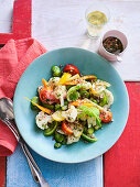Mixed summer vegetable salad with lovage