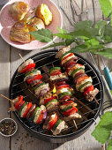 Grilled chicken and pork skewers