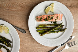 Freshly grilled salmon and asparagus, served on a plate