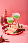 Christmas cocktails decorated with candy canes