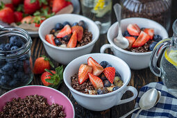Chocolate granola with yogurt and berries