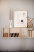 Ornaments on wooden, wall-mounted shelves