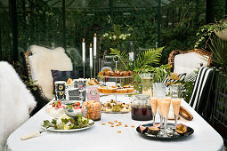 A table set for afternoon tea in the winter garden