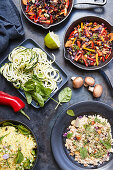 Vegetarian dishes - vegetable paella, cauliflower risotto, zoodles
