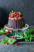 Chocolate cream cake with raspberries