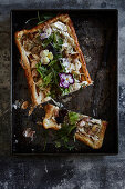 Artichoke and ricotta cake with baby salad