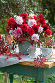 Autumnal dahlia bouquet with rose hips and Virginia creeper tendrils