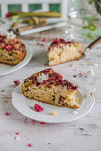 Cake with rhubarb and raspberries on a spring table