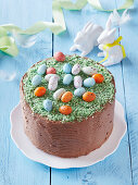 An Easter cake decorated with small sugar eggs