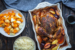 Chicken bake with plums and apples
