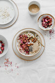 Porridge with pistachios rose petals chia and tahini paste