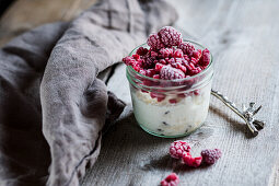 Cream parfait with frozen raspberries