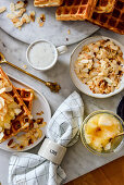 Waffles for breakfast with apples and almonds
