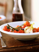 Oven-baked tomatoes with garlic