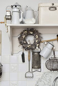 Collection of antique kitchen utensils as shabby-chic vintage-style decorations