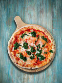 Pizza with spinach and gorgonzola cheese