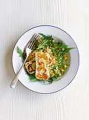 Halloumi with bulghar, chickpea and rocket salad