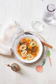 ‘Flädlesuppe' with carrot blossoms and beef