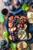 Baked autumn fruits with camembert cheese