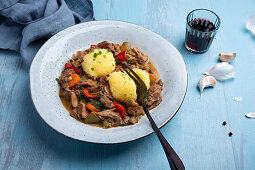 Potato dumplings with vegan soy goulash