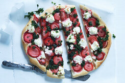 Sweet pizza with strawberries, pesto, and feta