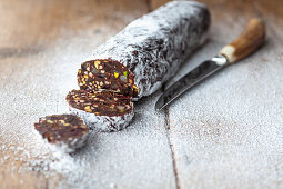 Chocolate salami with nuts and dried fruit