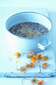 Make ointment from marigold (Calendula officinalis) - steep blossoms in water