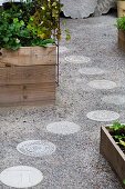 Garden path made from decorative concrete stepping stones