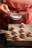 Currant-poppy-seed cookies dusted with powdered sugar