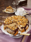 A cappuccino cake with chocolate and almonds