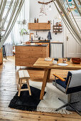 Handmade wooden dining table and kitchen units