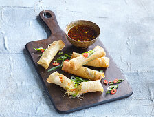 Spring rolls with vegetables and chili sauce