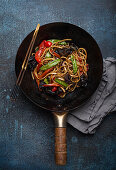 Stir fry udon noodles with vegetables and mushrooms