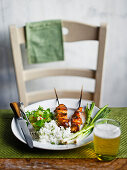 Chicken teriyaki skewers with griddled spring onions